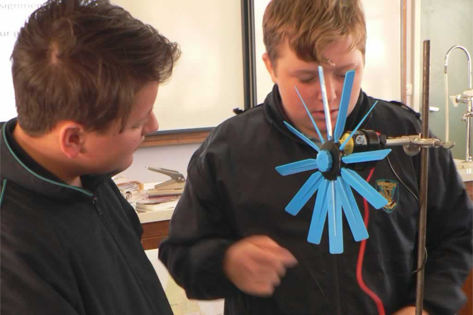 Two Male Students Blue Turbine Blades